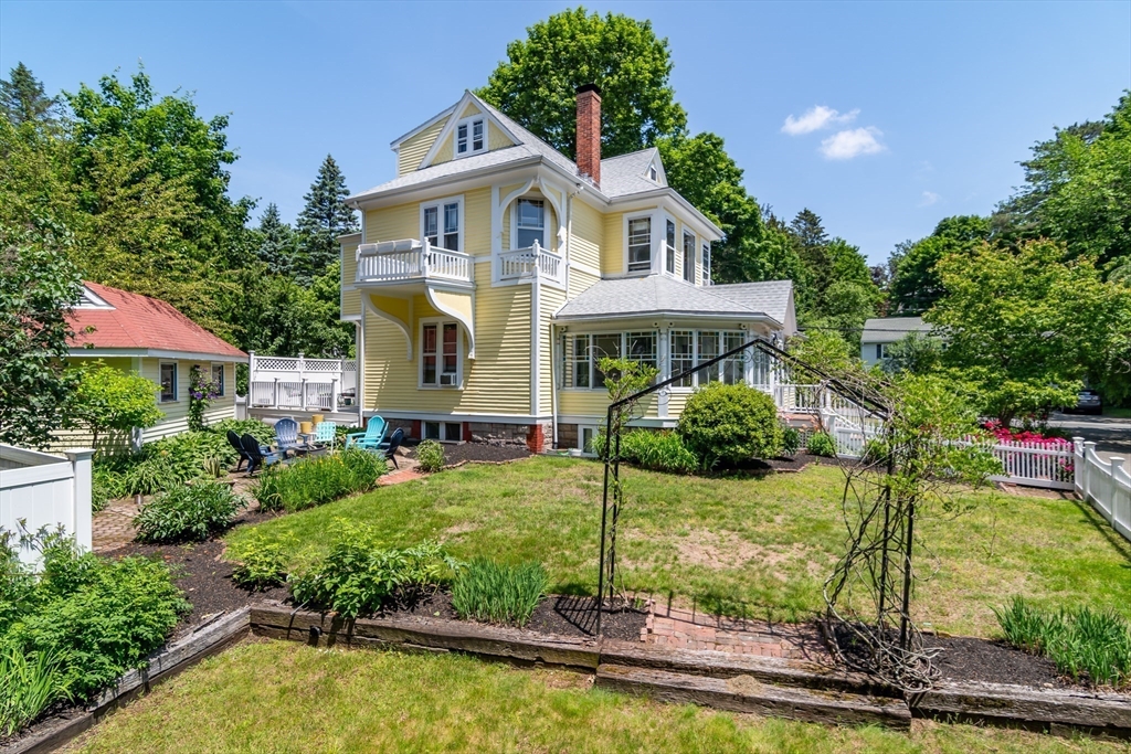 8 Charles Street Natick, MA 01760 - Photo 32 of 36 a view of a house with swimming pool and sitting area