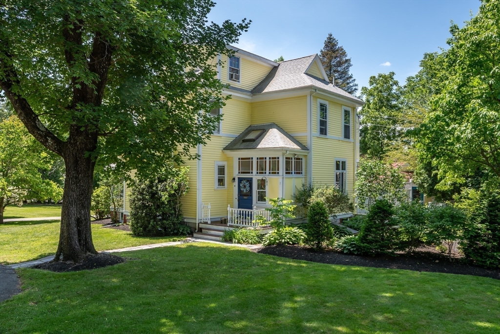 8 Charles Street Natick, MA 01760 - Photo 33 of 36 a front view of a house with a yard
