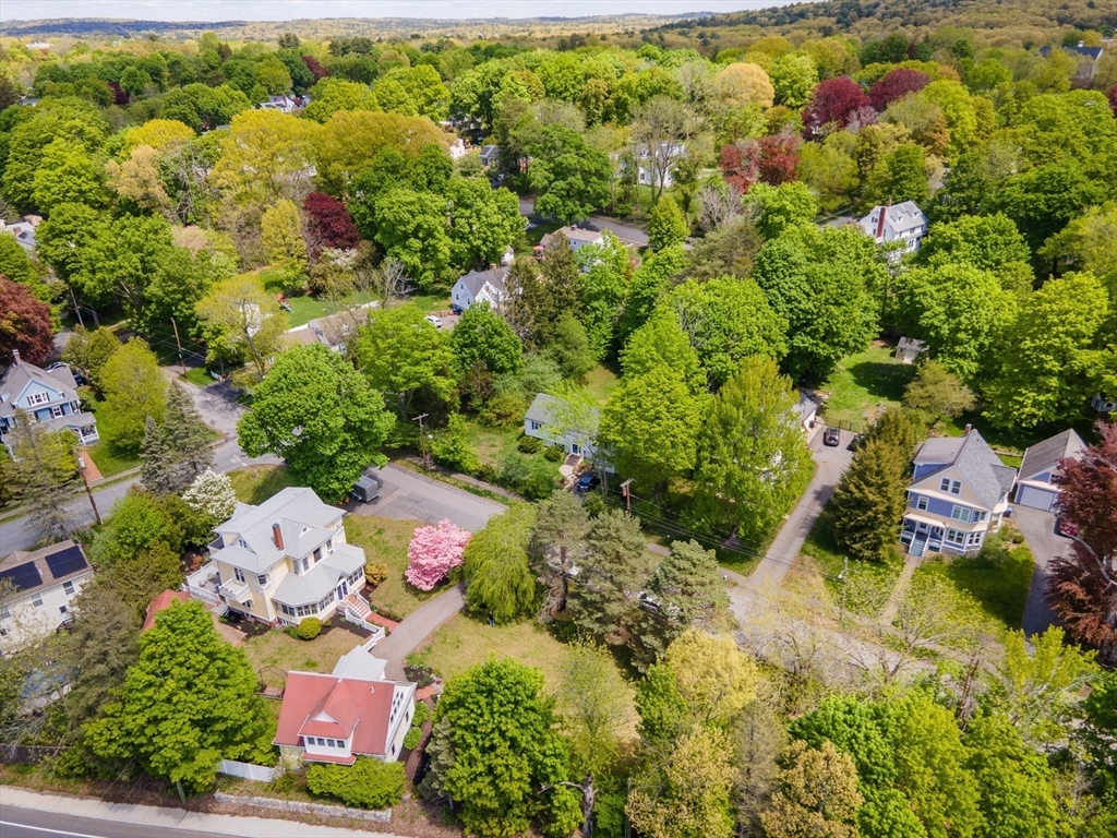 8 Charles Street Natick, MA 01760 - Photo 4 of 36 an aerial view of residential house with outdoor space and trees