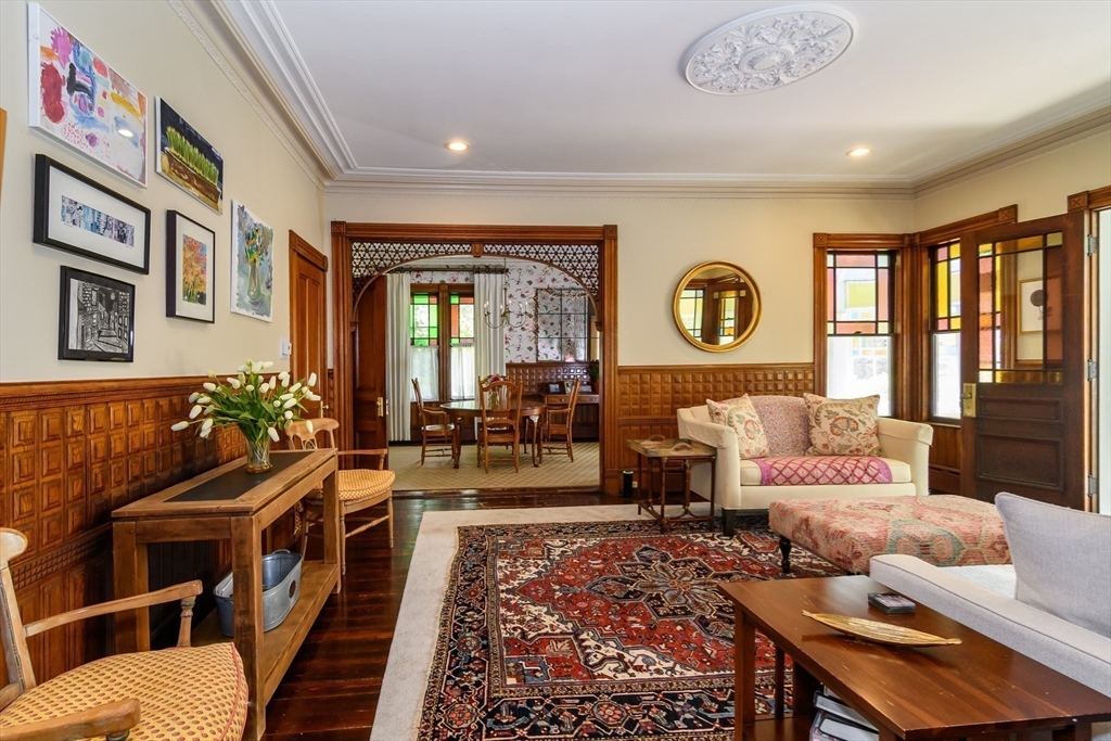 8 Charles Street Natick, MA 01760 - Photo 8 of 36 a living room with furniture and a large window