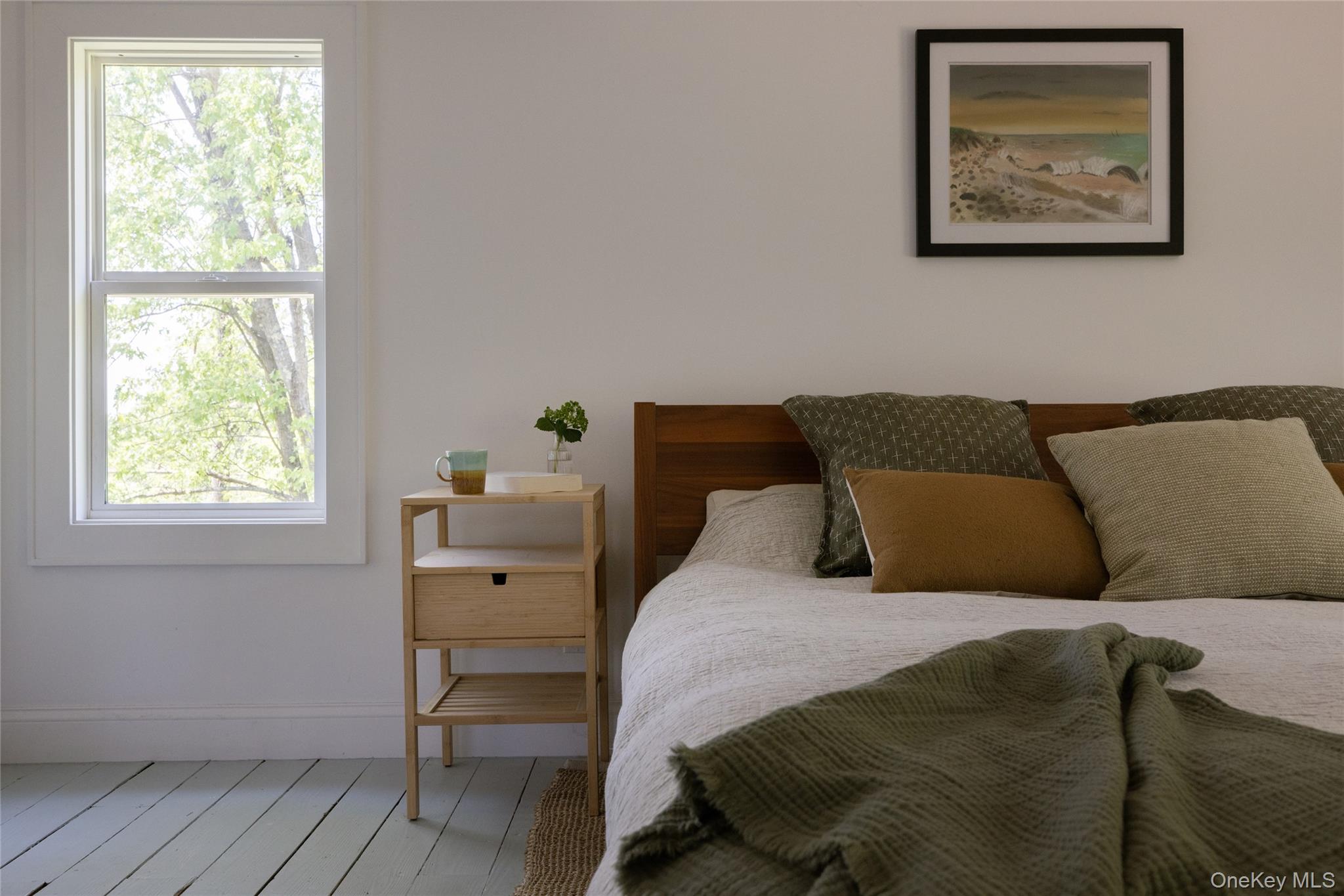 185 Verbank Village Road Millbrook, NY 12545 - Photo 14 of 22 a bedroom with a bed and wooden floor