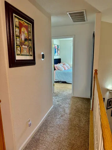 an empty room with wooden floor