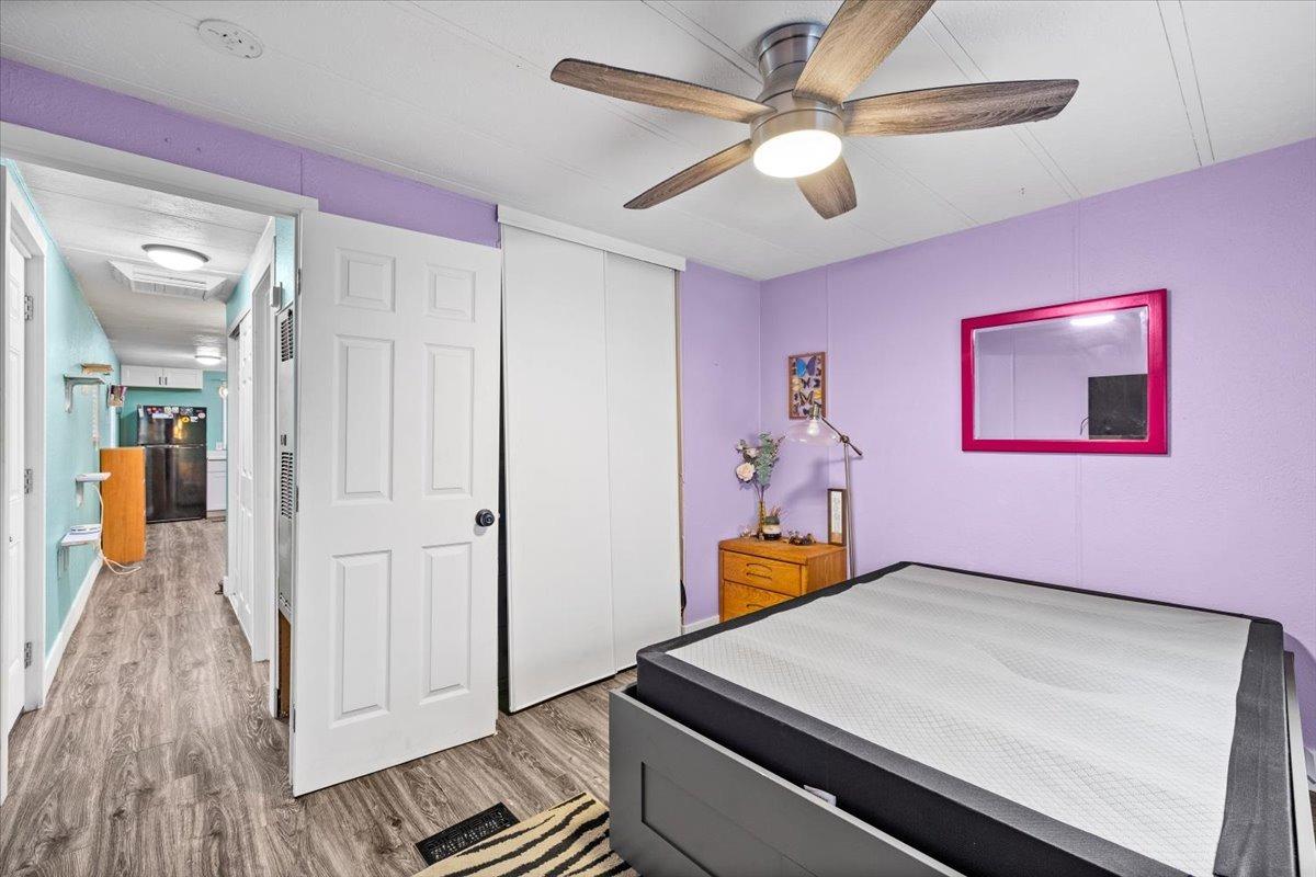8880 Auburn Folsom Road, Unit 20 Granite Bay, CA 95746 - Photo 10 of 17 a room with musical instruments and wooden floor