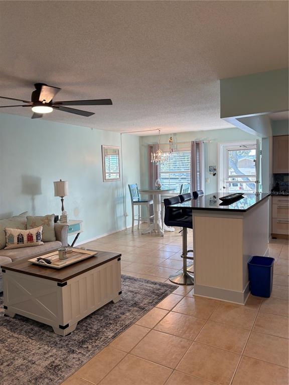 14531 Walsingham Road, Unit 224 Largo, FL 33774 - Photo 13 of 41 a living room with furniture and a wooden floor