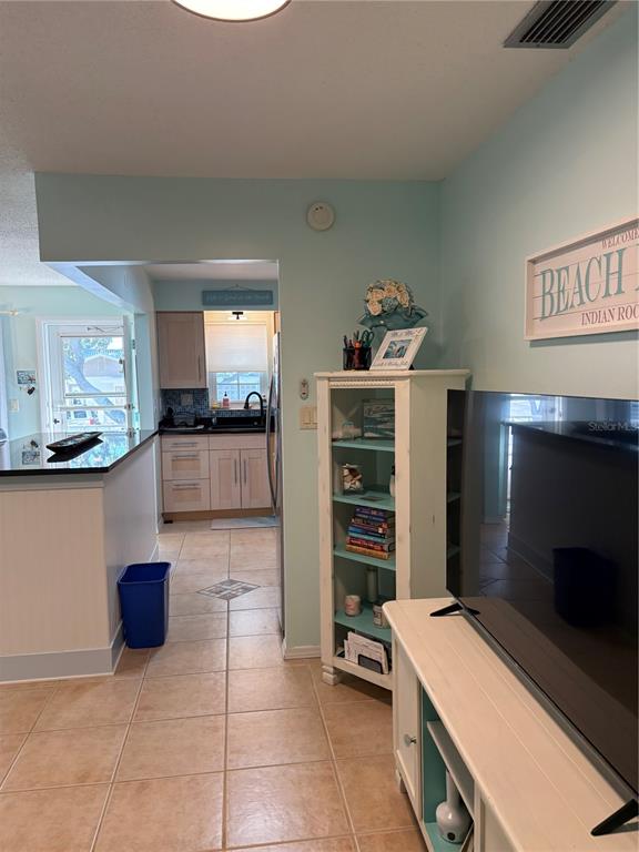 14531 Walsingham Road, Unit 224 Largo, FL 33774 - Photo 19 of 41 a room with furniture and a fireplace