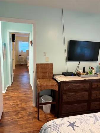 a room that has a bed and a chair