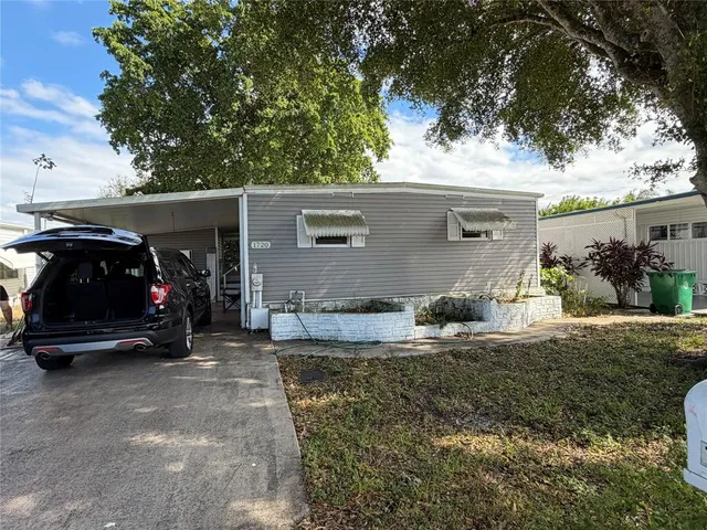 a view of car parked in front of house