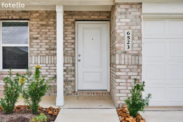 a front view of a house with a shower