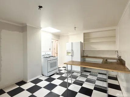 a bathroom with a sink a toilet and bathtub