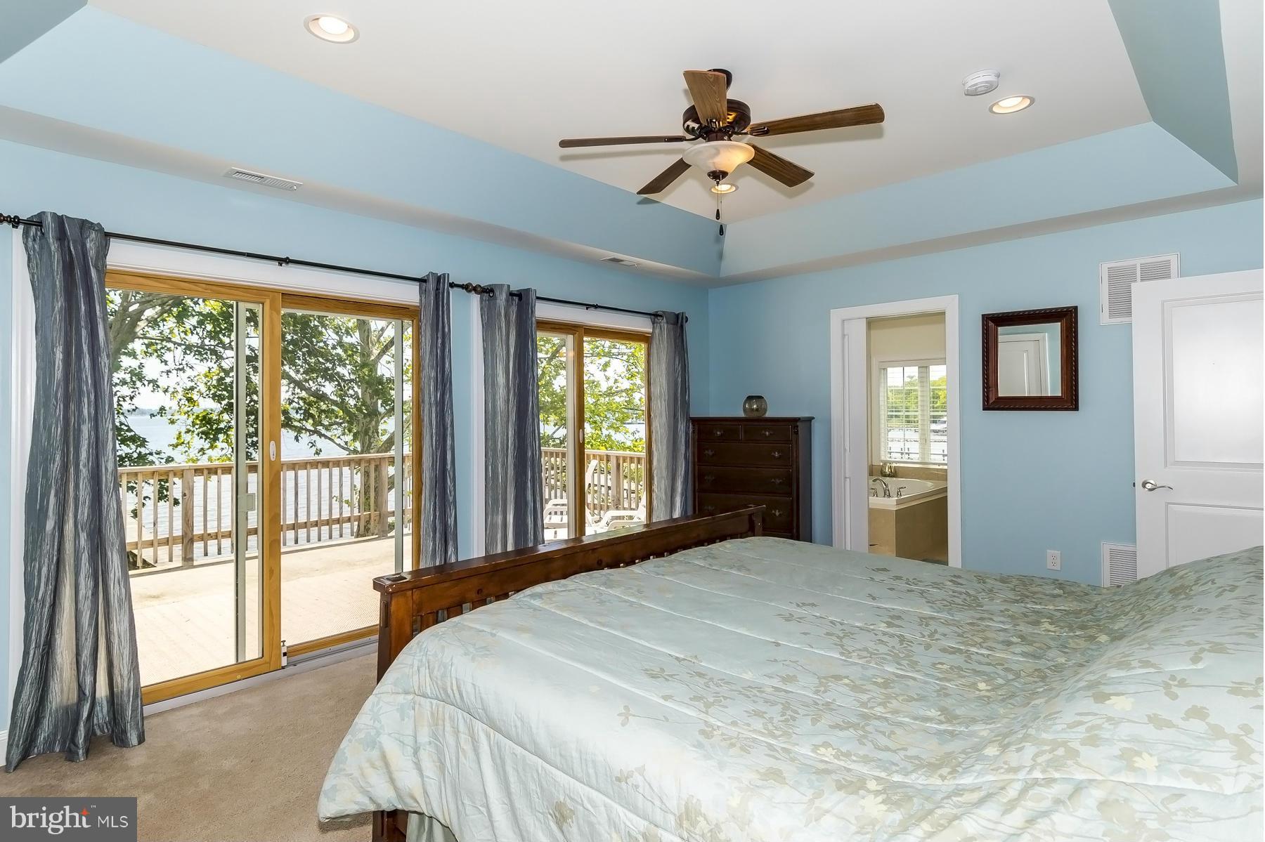 793 Riverside Drive Arnold, MD 21012 - Photo 15 of 29 Master has a balcony overlooking the water.
