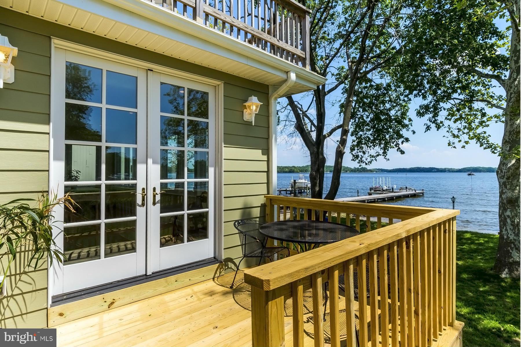 793 Riverside Drive Arnold, MD 21012 - Photo 26 of 29 Deck off Sun room leads to rear yard.
