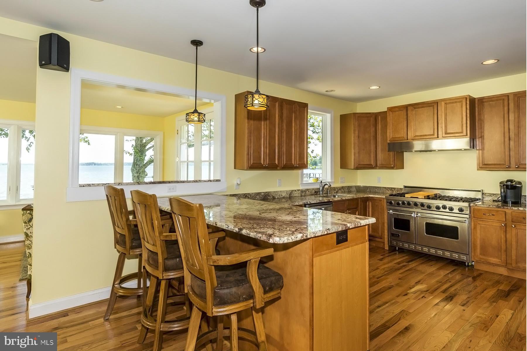 793 Riverside Drive Arnold, MD 21012 - Photo 4 of 29 Kitchen has a breakfast bar.