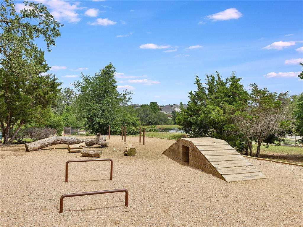 736 Bonnet Boulevard Georgetown, TX 78628 - Photo 25 of 27 a view of a swimming pool with a lounge chair