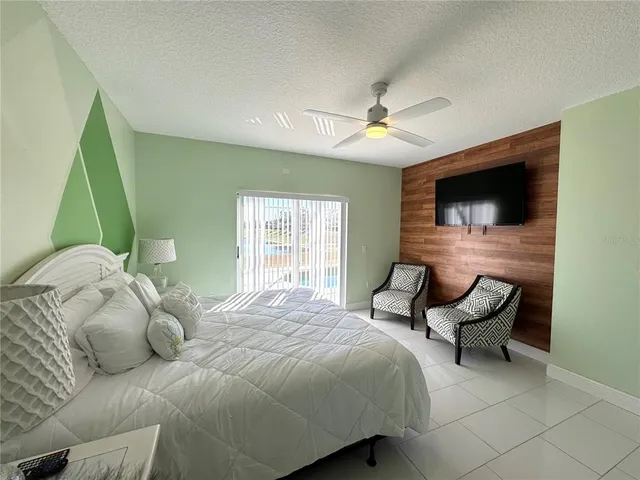 a bedroom with a bed and furniture