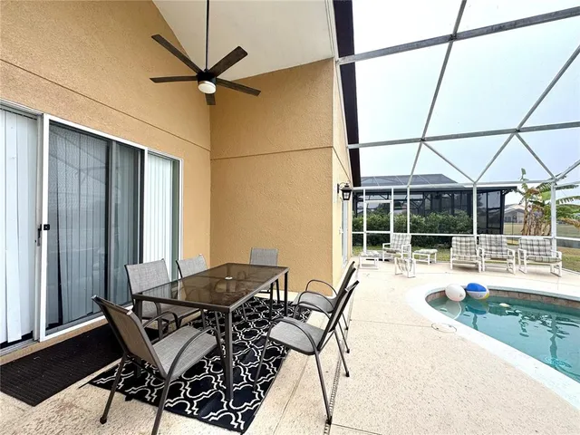 a view of a livingroom with furniture and a table