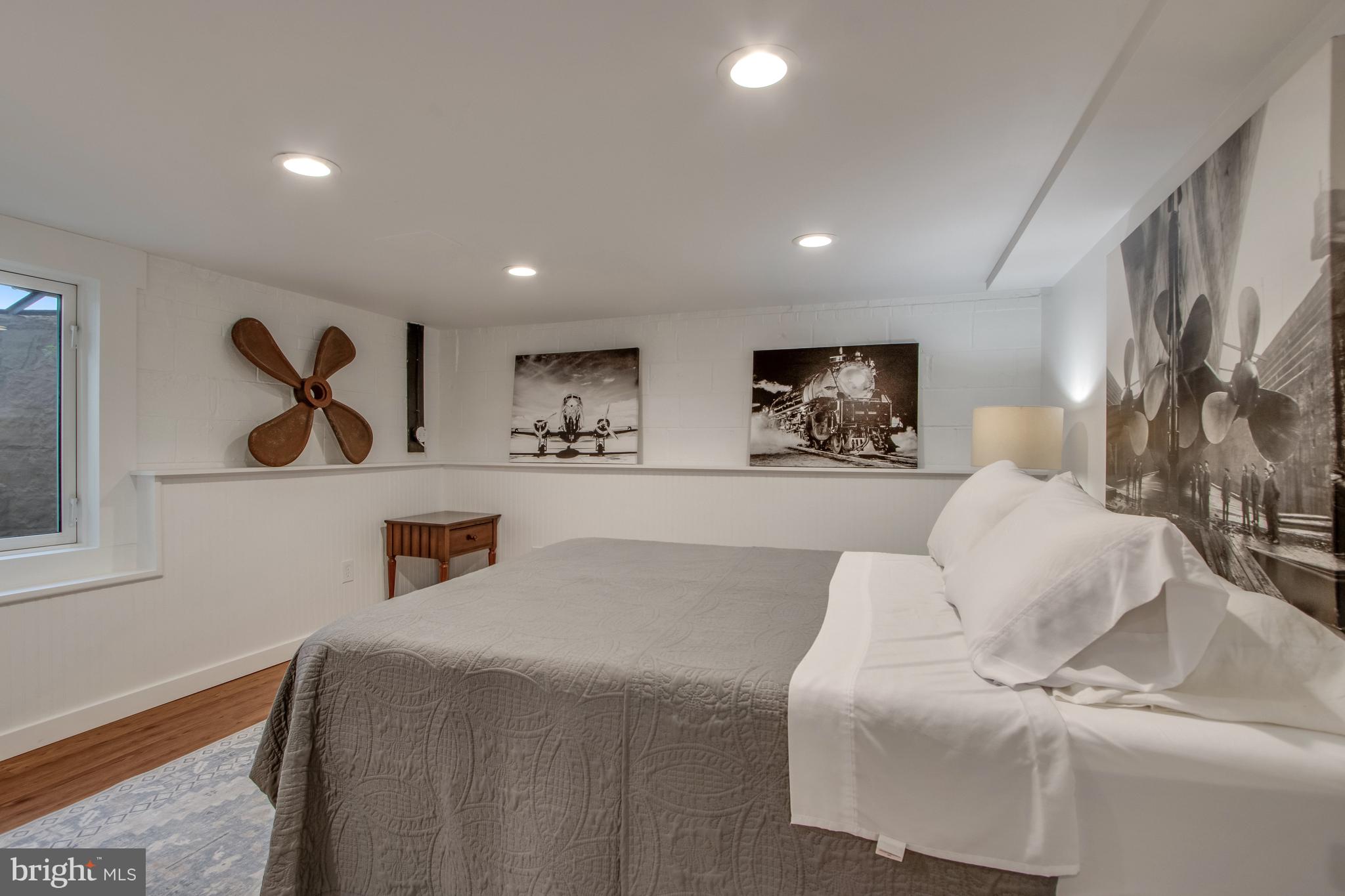 901 Savannah Road Lewes, DE 19958 - Photo 33 of 83 a living room with furniture and wall paintings