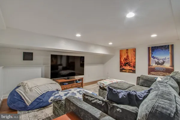 a kitchen with granite countertop a sink stainless steel appliances and cabinets