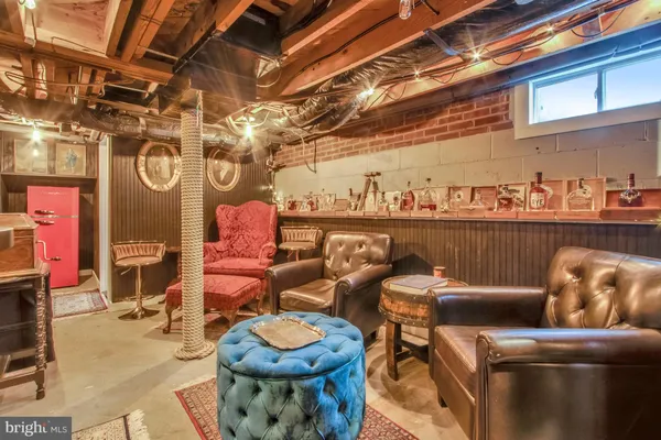 a kitchen with stainless steel appliances granite countertop a stove and a white cabinets