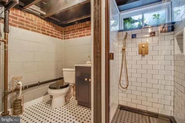 a view of a backyard with sitting area