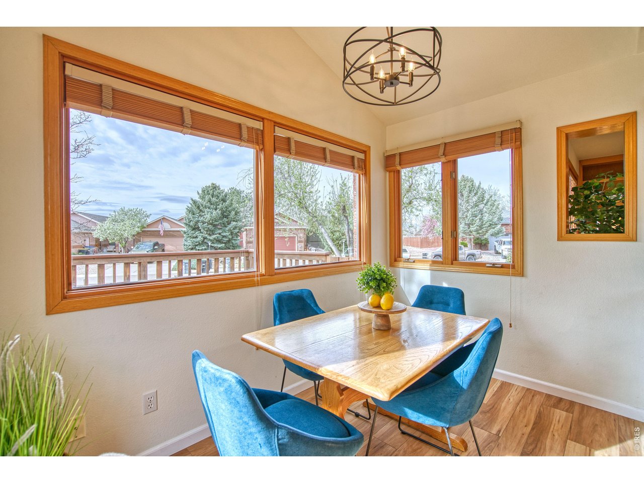 824 Wade Road Longmont, CO 80503 - Photo 13 of 34 a view of a dining room with furniture window and outside view