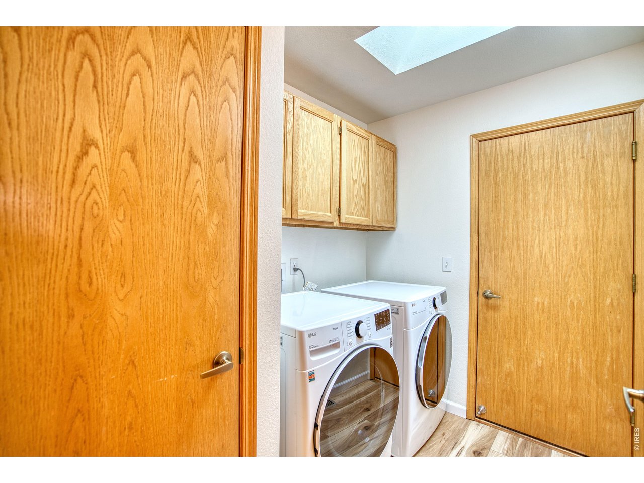 824 Wade Road Longmont, CO 80503 - Photo 22 of 34 a utility room with dryer and washer