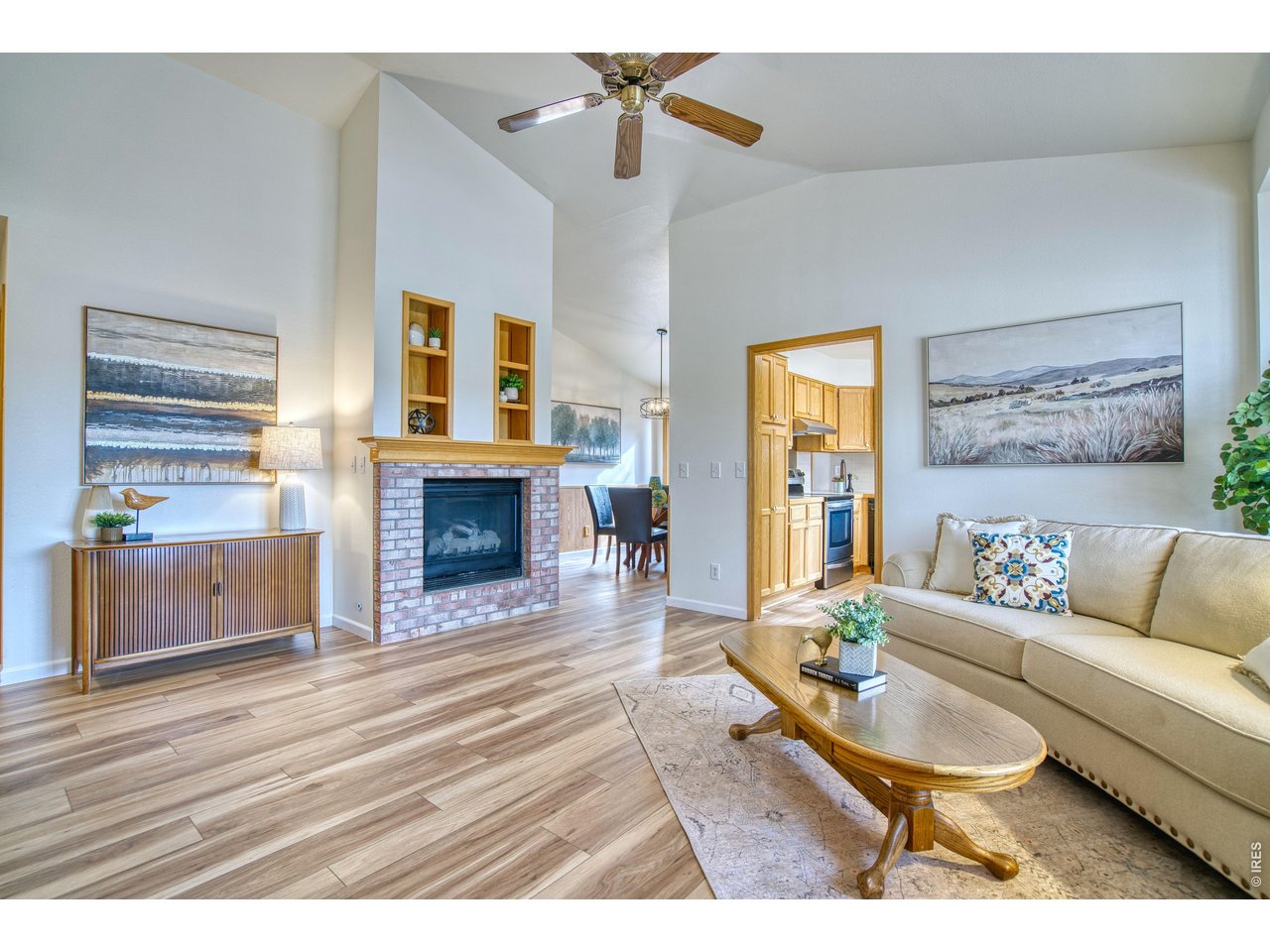 824 Wade Road Longmont, CO 80503 - Photo 5 of 34 a living room with furniture and a fireplace