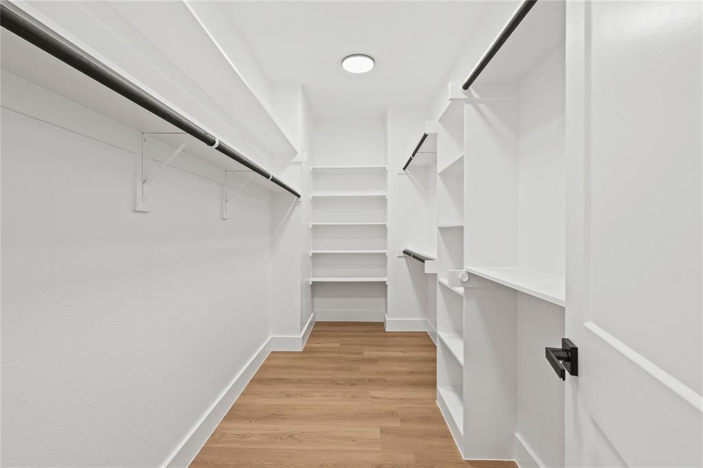 2820 Barnes Bridge Road Dallas, TX 75228 - Photo 21 of 29 a view of walk in closet