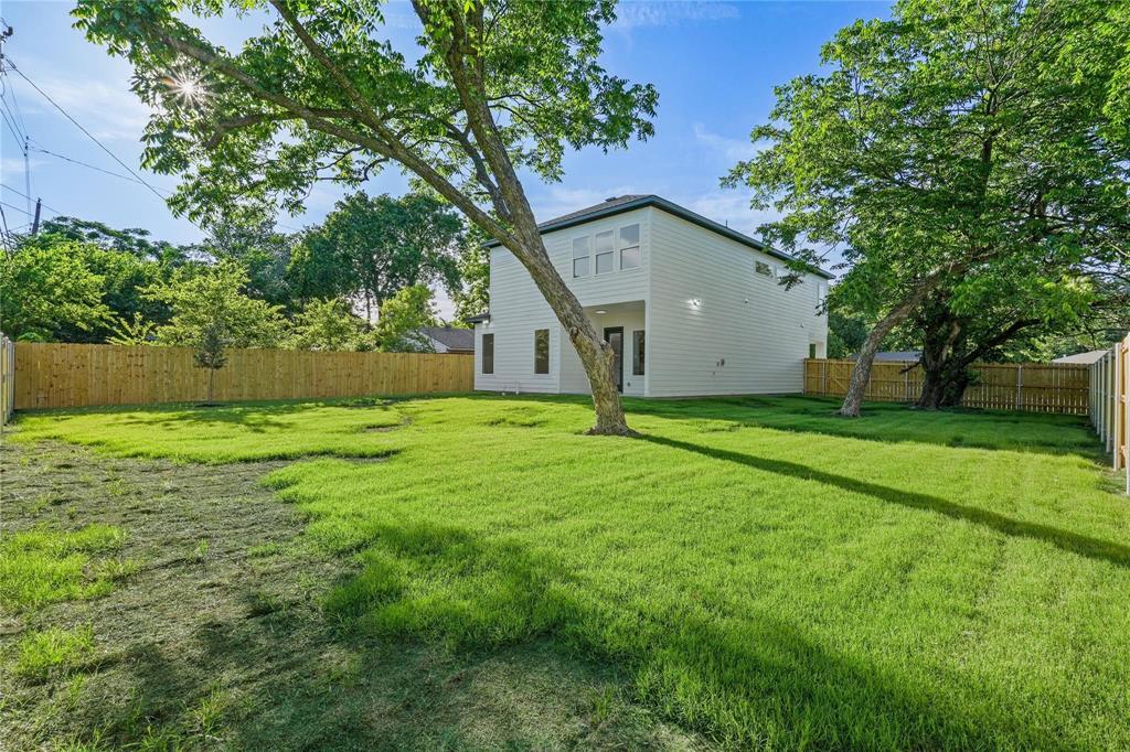 2820 Barnes Bridge Road Dallas, TX 75228 - Photo 28 of 29 a view of a house with backyard and garden