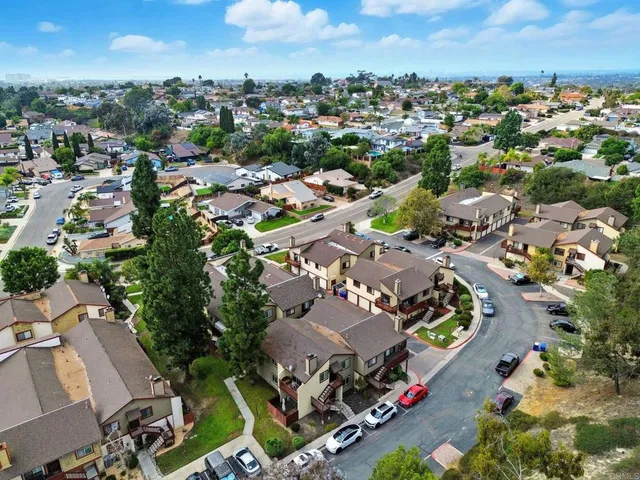 an aerial view of a city with lots of residential buildings