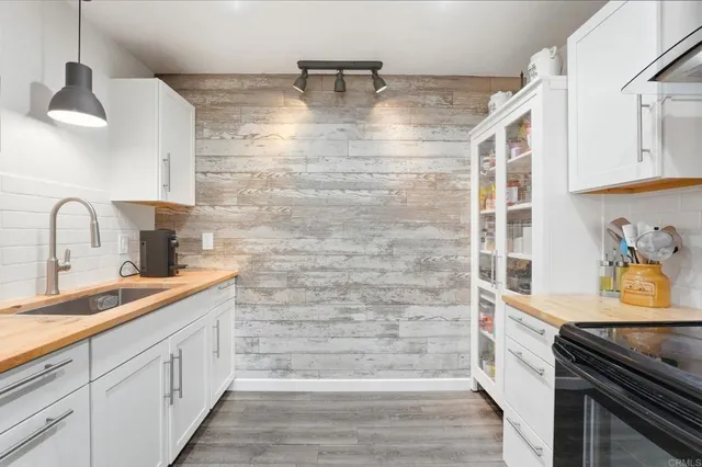 a bathroom with a sink and a shower
