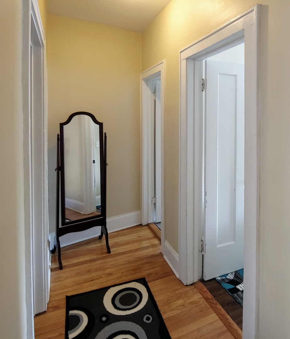 4815 North Springfield Avenue, Unit 3E Chicago, IL 60625 - Photo 6 of 8 a view of a room with a wardrobe