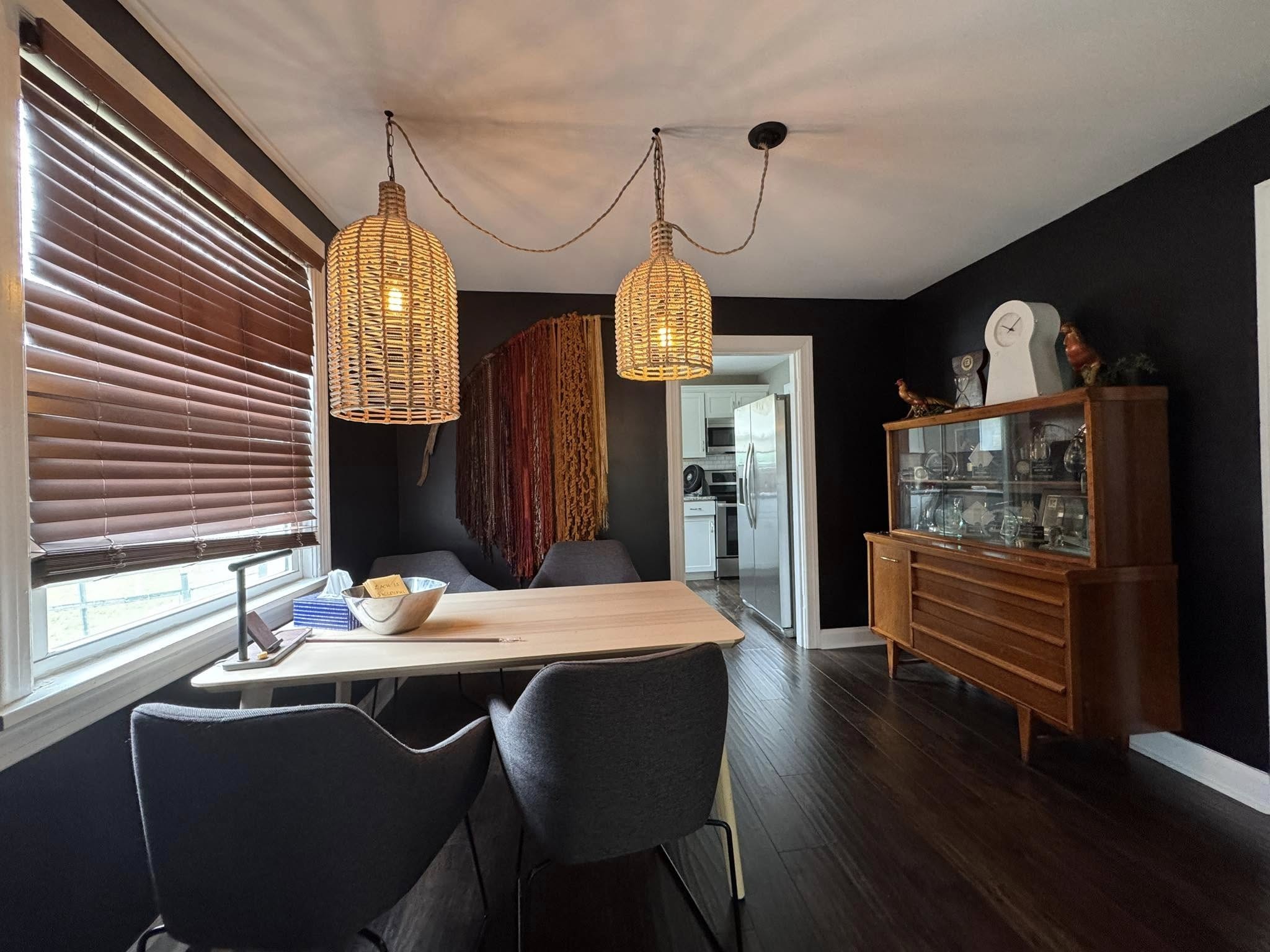 212 Neelys Bend Road Madison, TN 37115 - Photo 4 of 14 a view of a dining room with furniture window and wooden floor