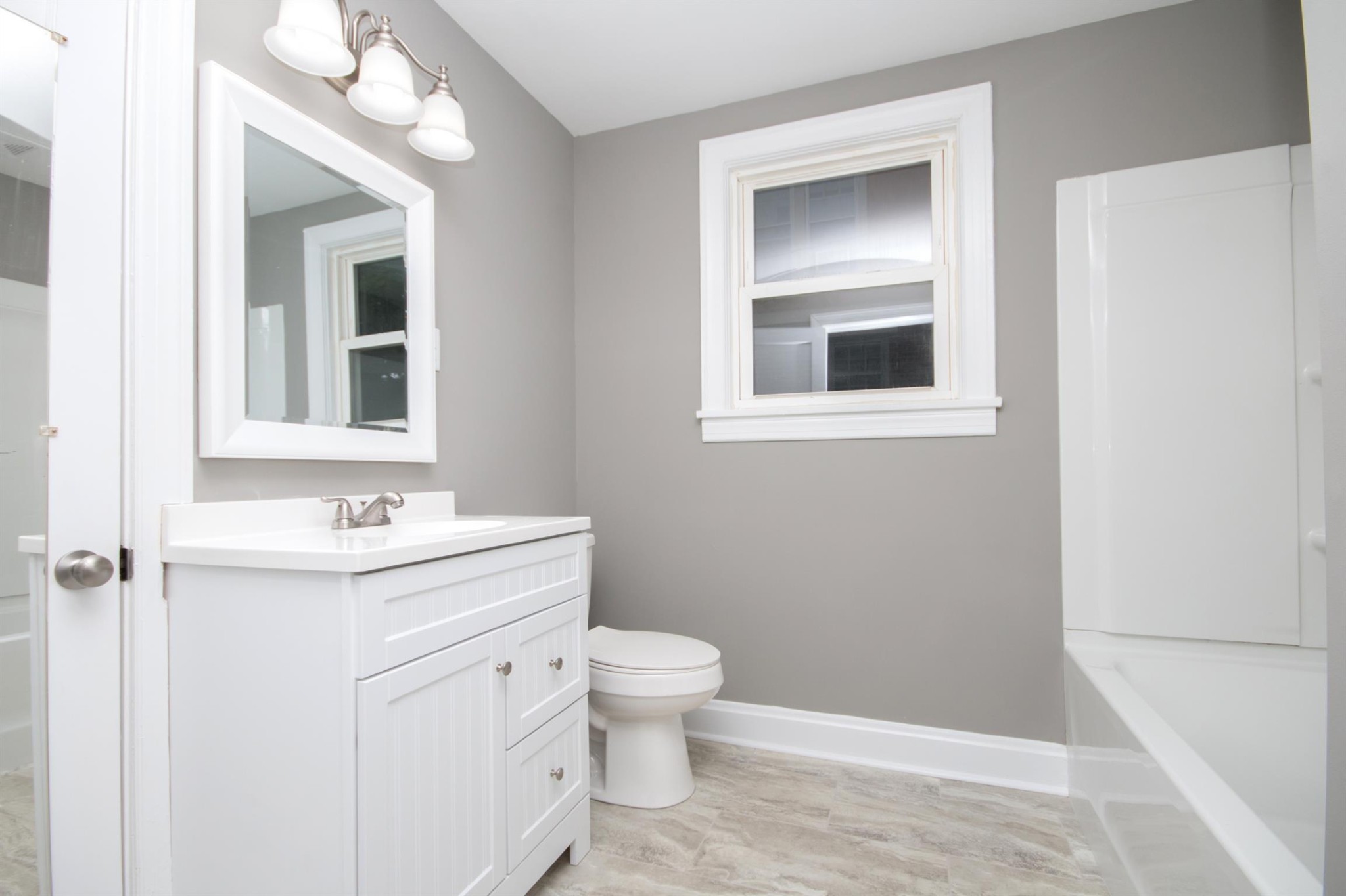 212 Neelys Bend Road Madison, TN 37115 - Photo 7 of 14 a bathroom with a sink toilet and vanity