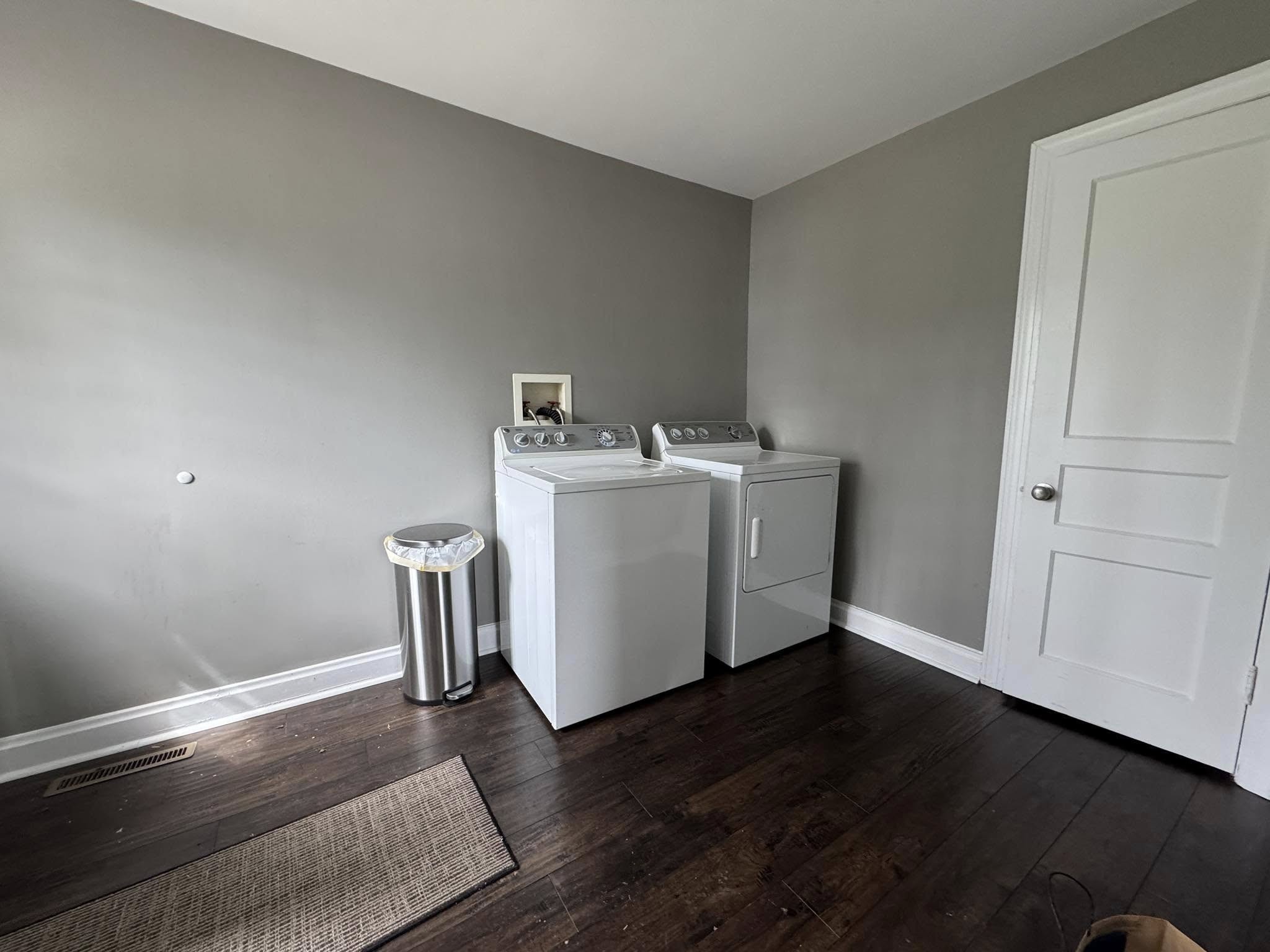 212 Neelys Bend Road Madison, TN 37115 - Photo 8 of 14 a utility room with wooden floor washer and dryer