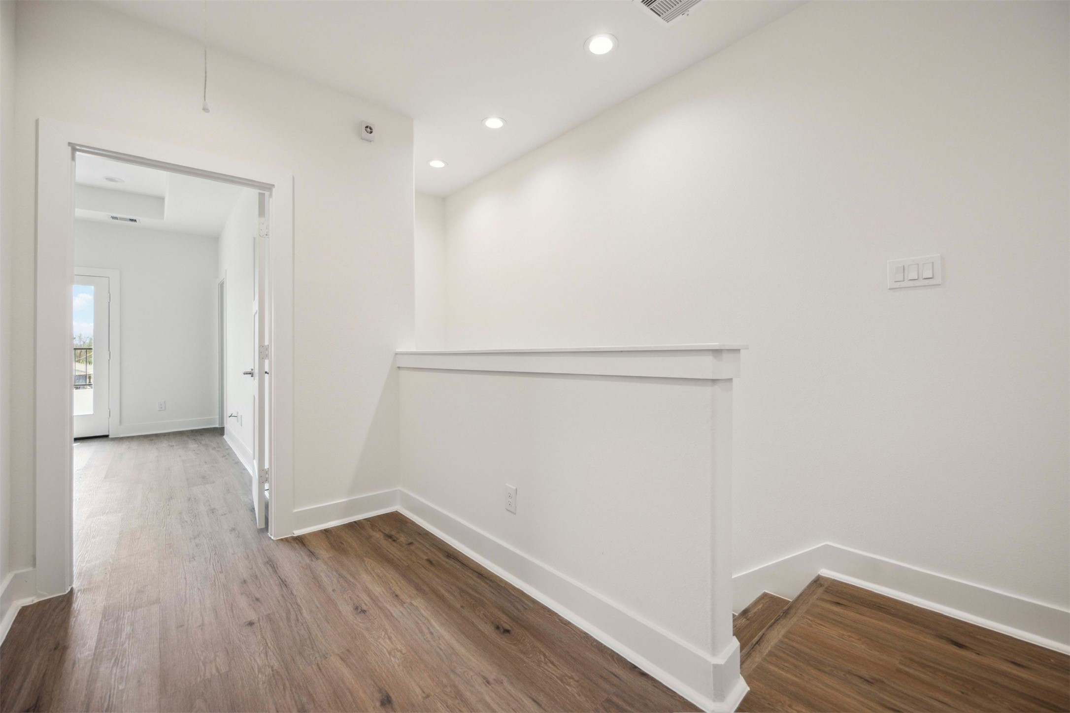 3504 Caplin Street, Unit B Houston, TX 77026 - Photo 11 of 26 a view of room with wooden floor
