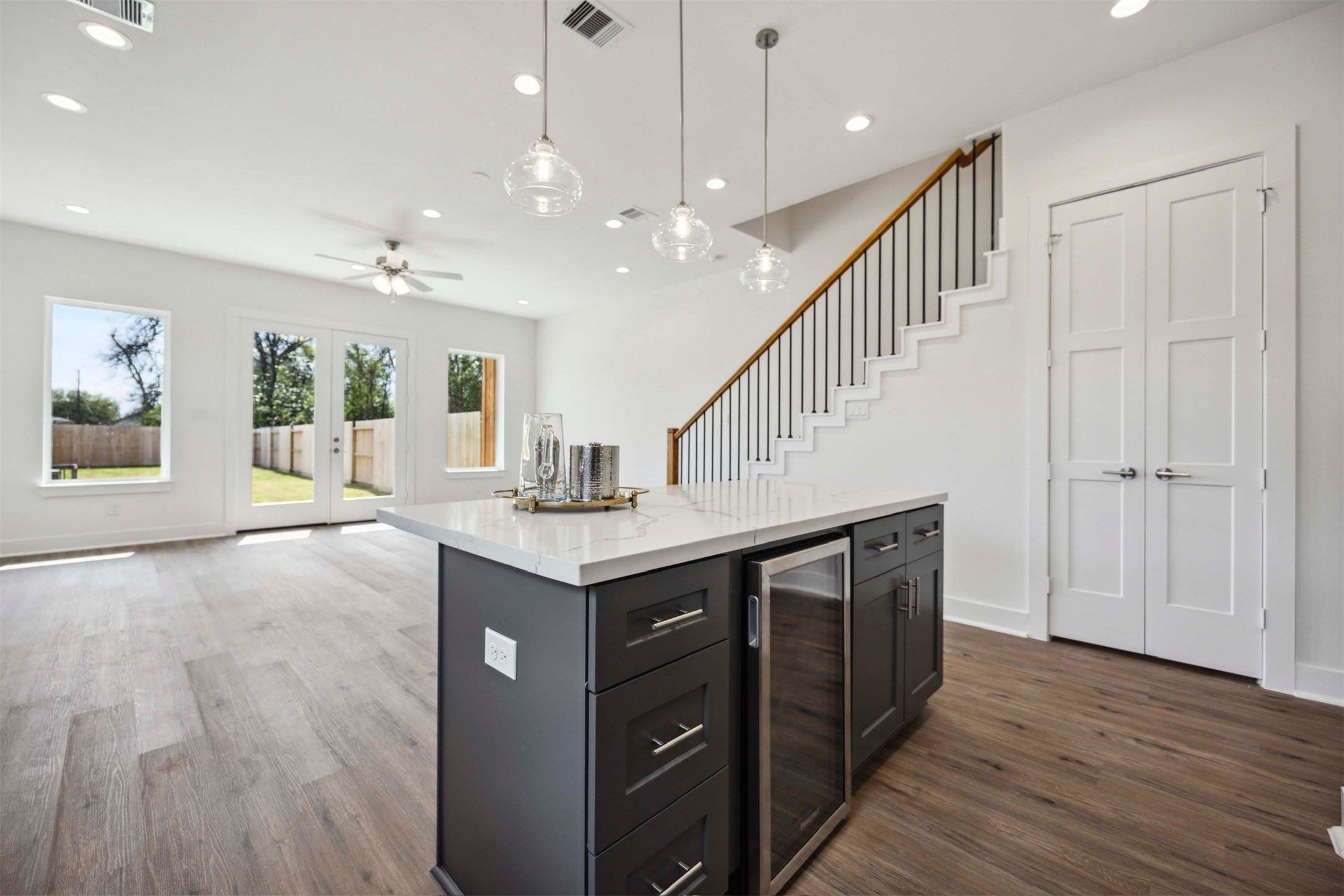 3504 Caplin Street, Unit B Houston, TX 77026 - Photo 2 of 26 a kitchen with a sink and wooden floor