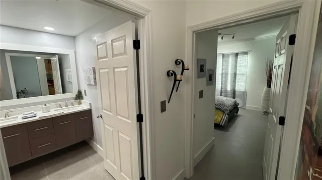 a bedroom with a bed and a couch