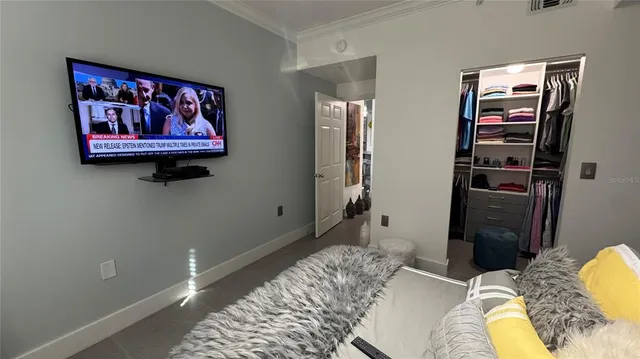 a bathroom with a double vanity sink and mirror