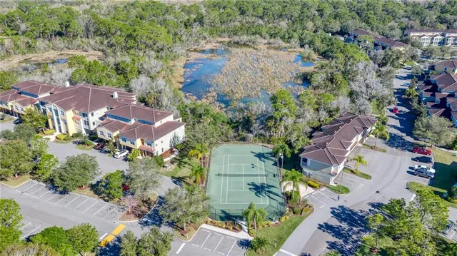 a living room with furniture a dining table and chairs