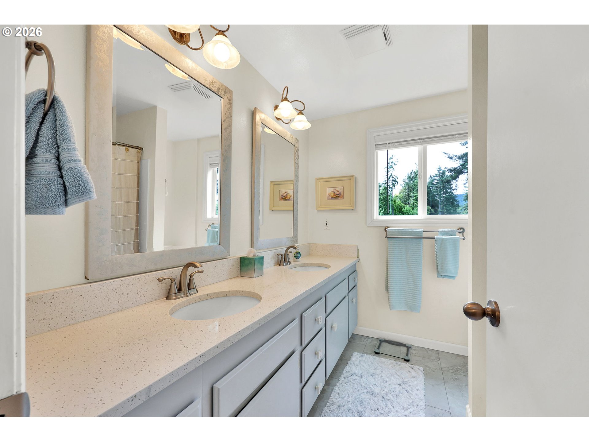 88108 Tiki Lane Springfield, OR 97478 - Photo 33 of 48 a bathroom with a sink double vanity granite and a mirror