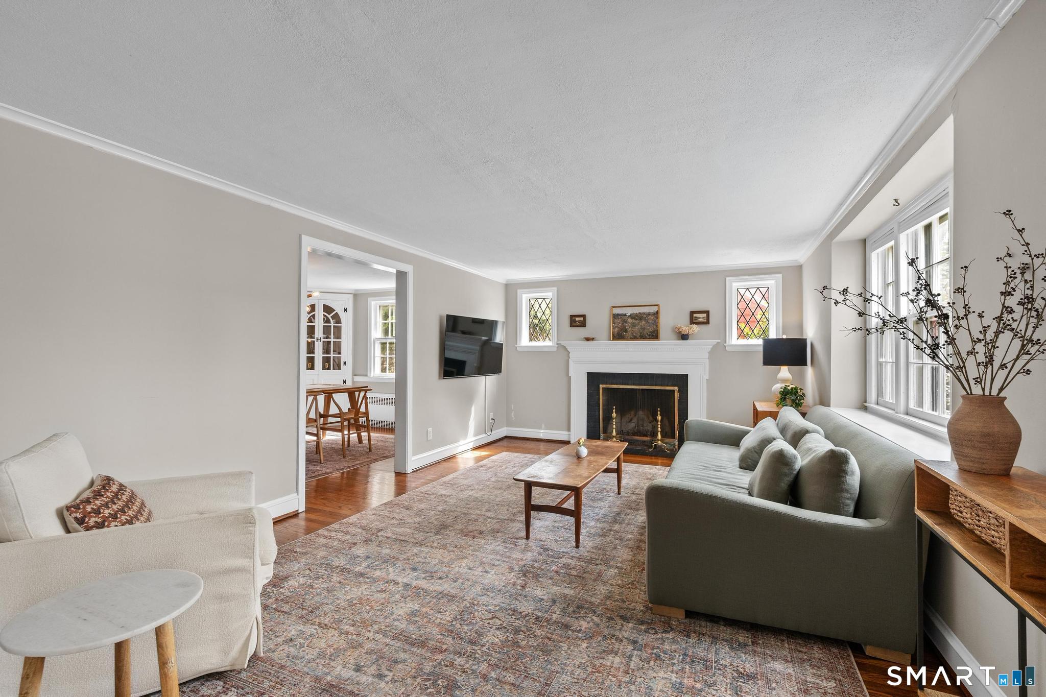 40 Fairlee Road West Hartford, CT 06107 - Photo 3 of 40 Spacious living room with wood burning fireplace.