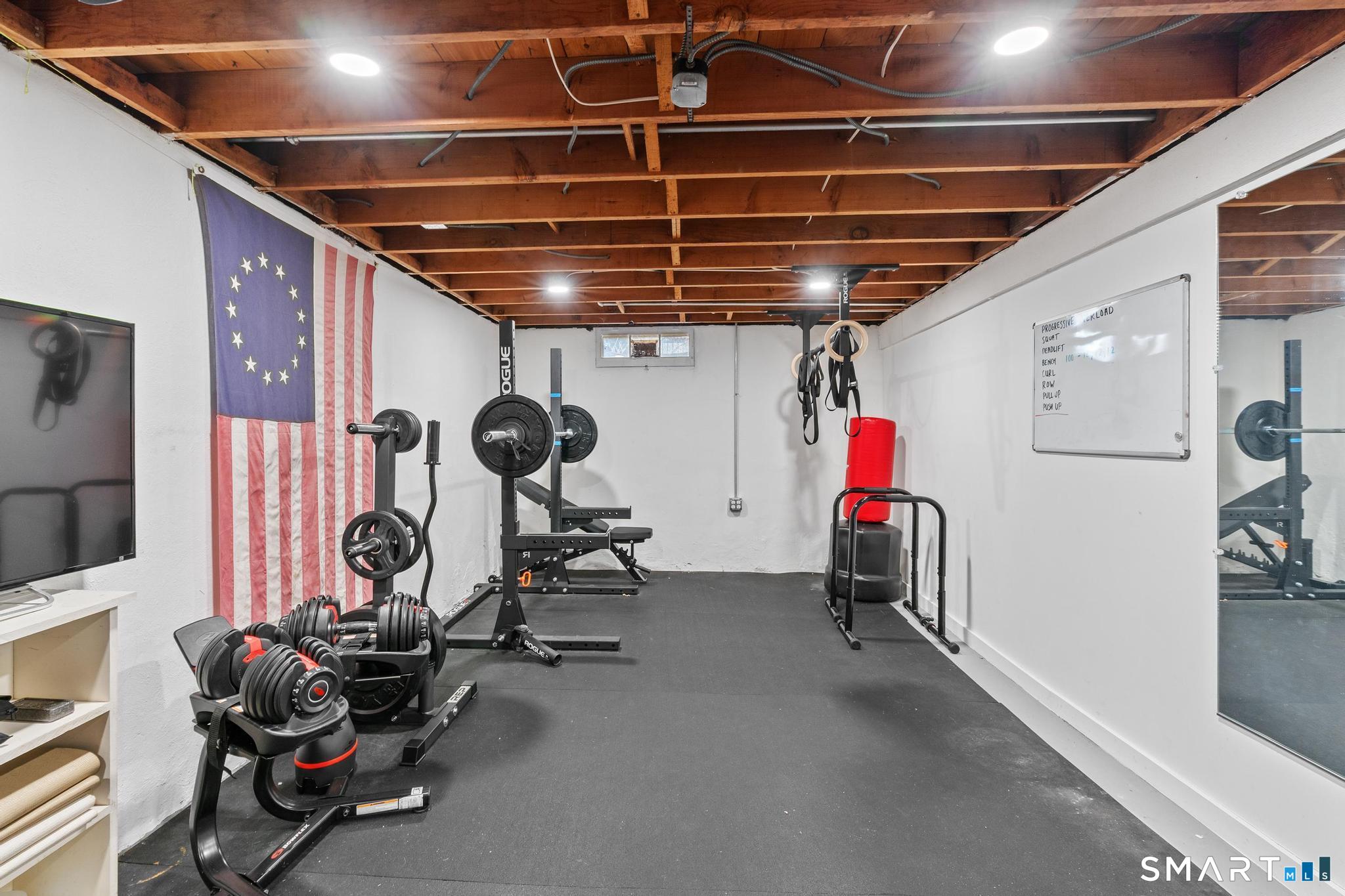 40 Fairlee Road West Hartford, CT 06107 - Photo 33 of 40 Lower level fitness area with plenty of space for workouts and storage.