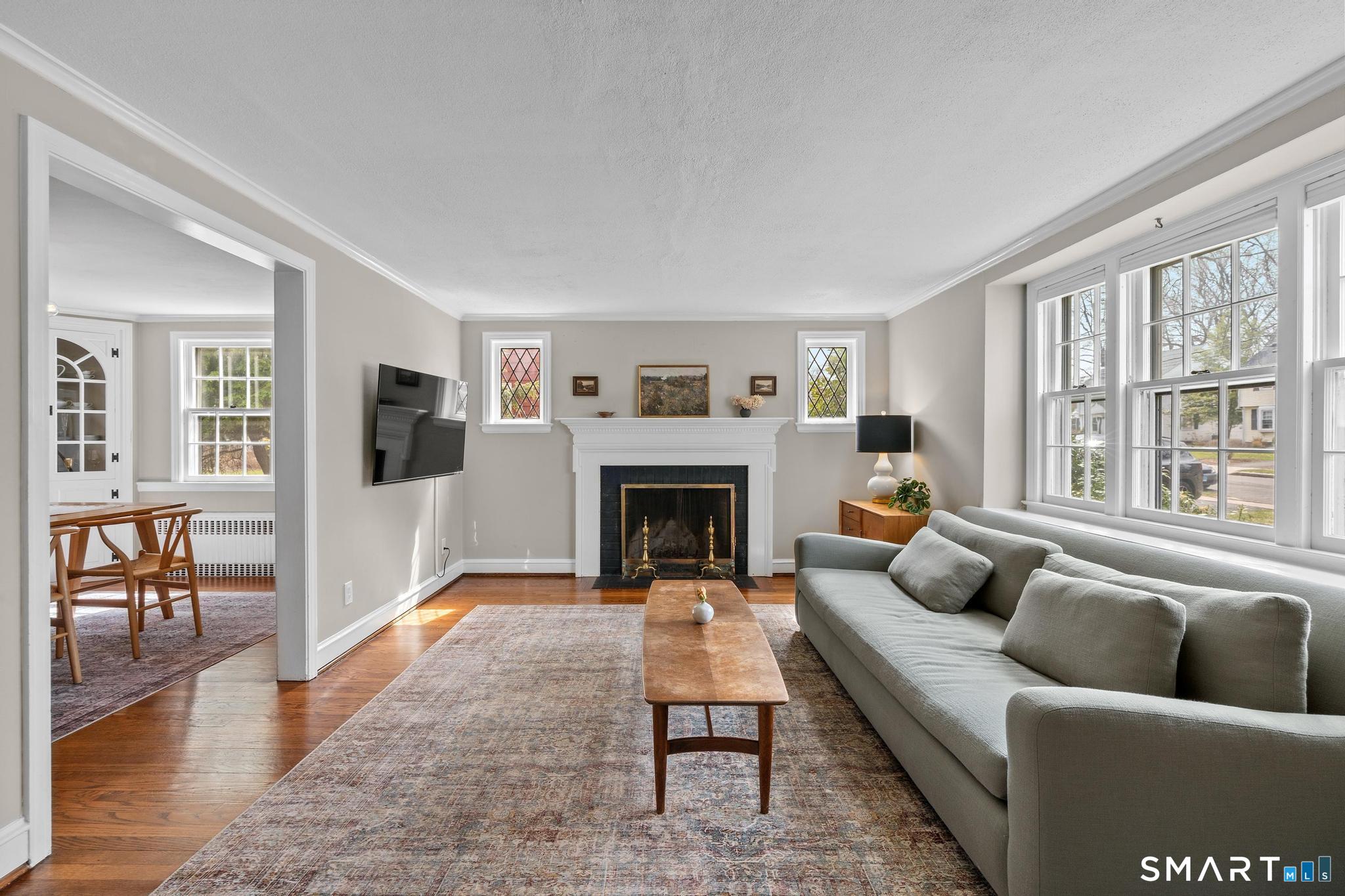 40 Fairlee Road West Hartford, CT 06107 - Photo 4 of 40 The living room is adjacent to the dining rom-- perfect for entertaining friends & family!