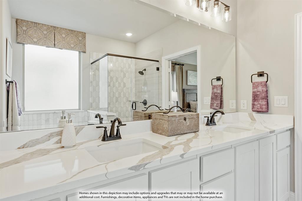1118 Cardinal Drive Midlothian, TX 76065 - Photo 23 of 39 a bathroom with double vanity sinks a mirror and a shower