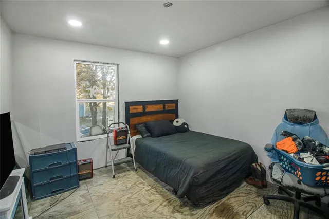 a view of a hallway with wooden shelves