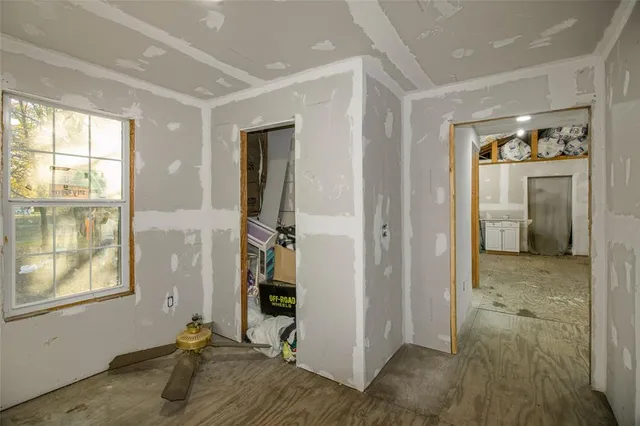 a view of a brick wall with a bathroom