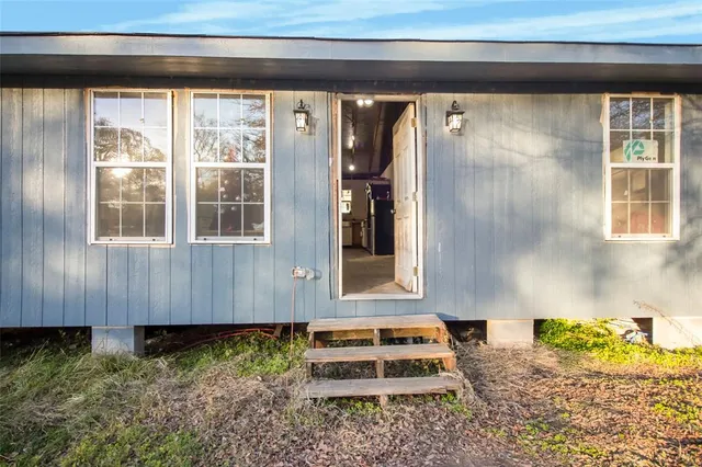 a view of an ocean with residential houses