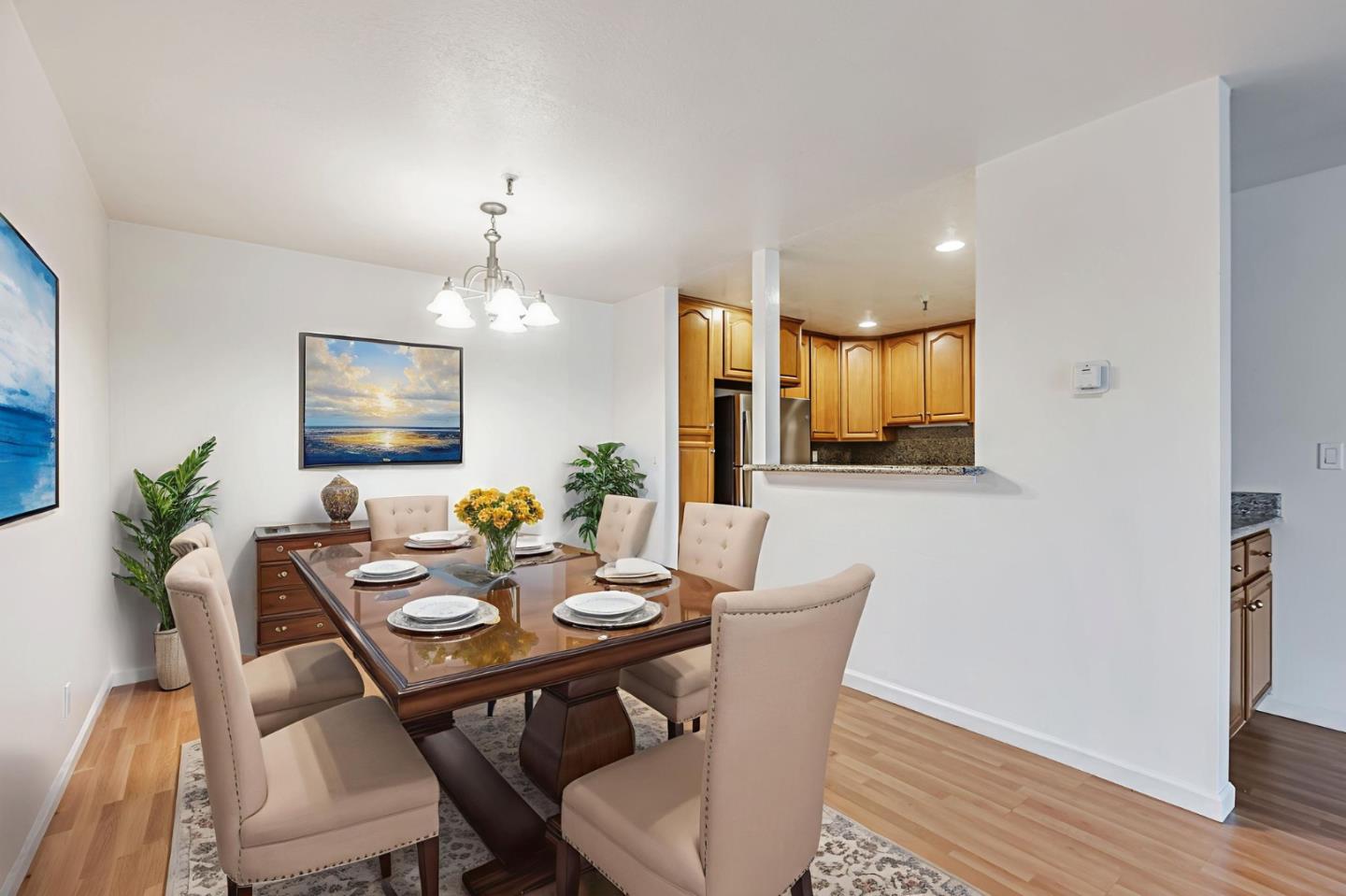 49 Showers Drive, Unit W203 Mountain View, CA 94040 - Photo 4 of 38 a view of a dining room with furniture and wooden floor