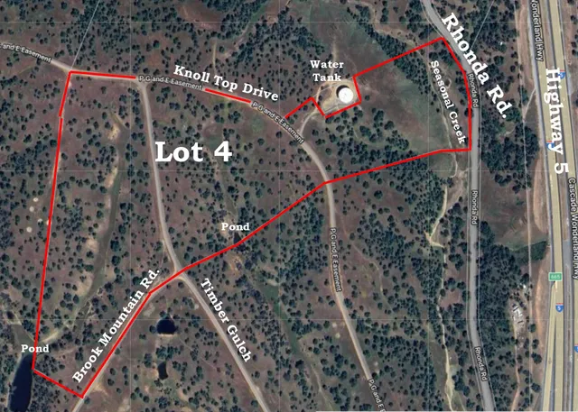 a view of an outdoor space and basketball court