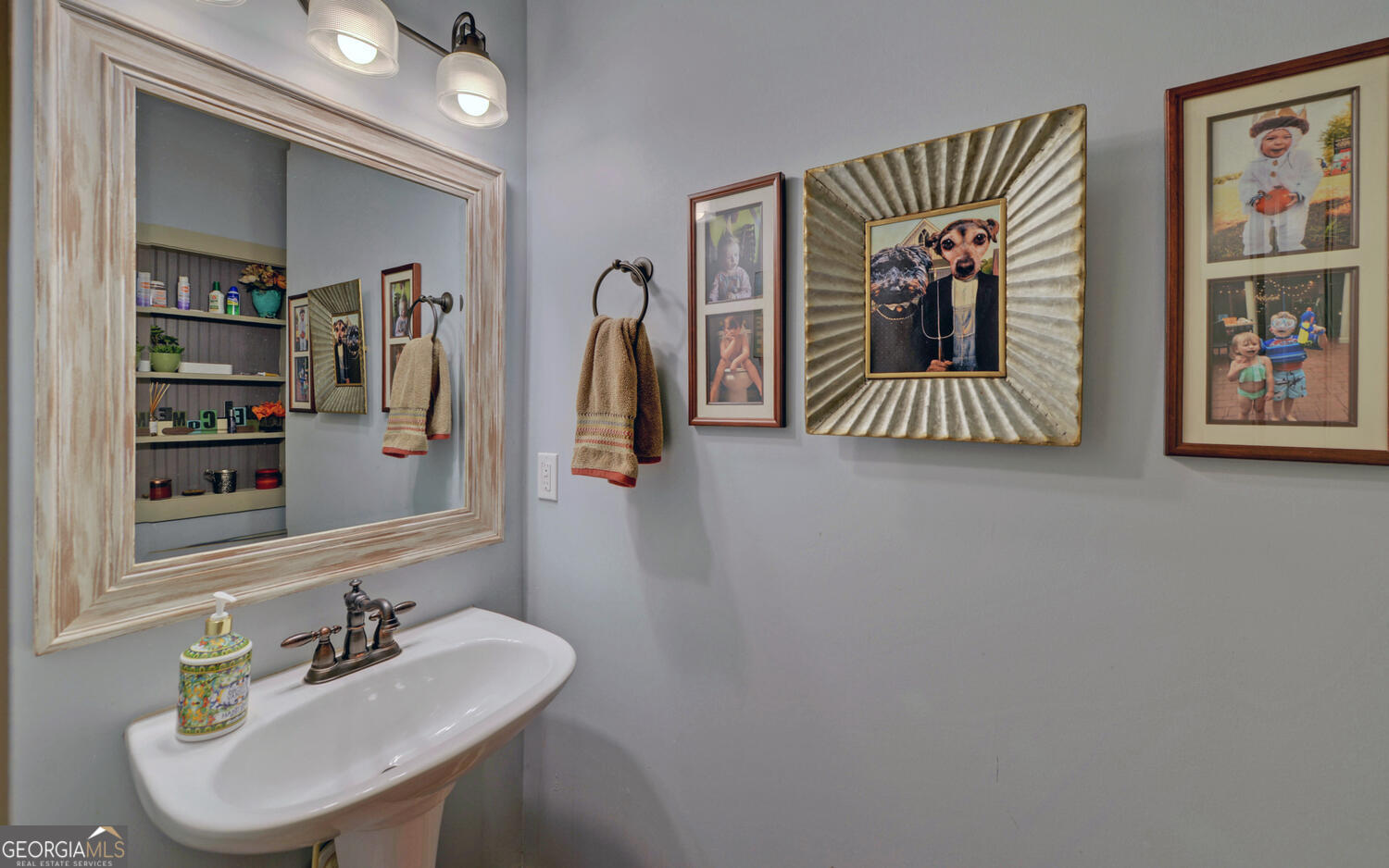 819 Tranquility Lane Hartwell, GA 30643 - Photo 21 of 81 a bathroom with a sink and a mirror